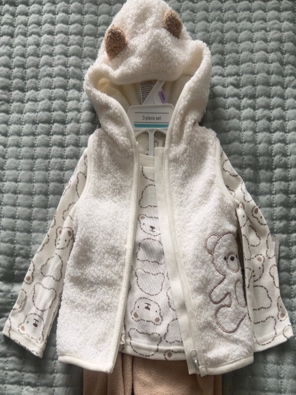 Baby/Starters three-piece set featuring a cozy hooded vest adorned with ears